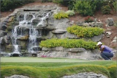  ?? Associated Press ?? On the green: Tiger Woods lines up a putt on the 13th hole during the first round of the PGA Championsh­ip golf tournament at Valhalla Golf Club on Aug. 7, 2014, in Louisville, Ky. The PGA returns to Valhalla on May 16-19, 2024.