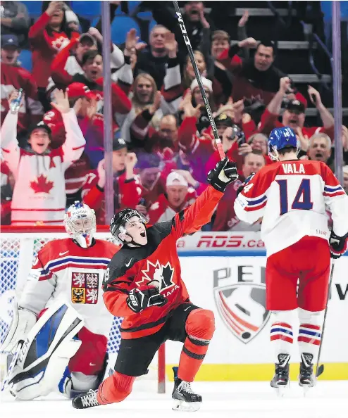  ?? NATHAN DENETTE / THE CANADIAN PRESS ?? Drake Batherson celebrates one of his three goals against the Czech Republic in Canada’s semifinal win.