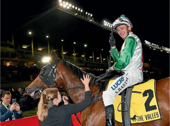  ??  ?? Stephen Baster riding Jon Snow after winning the JRA Trophy at Moonee Valley.