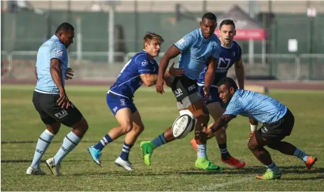  ??  ?? Fiji, in light blue, paid the Jebel Ali Dragons and Dubai Sports City Eagles back with some friendly matches