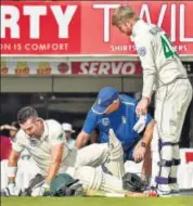  ??  ?? Dean Elgar after getting hit by an Umesh Yadav delivery.
PTI