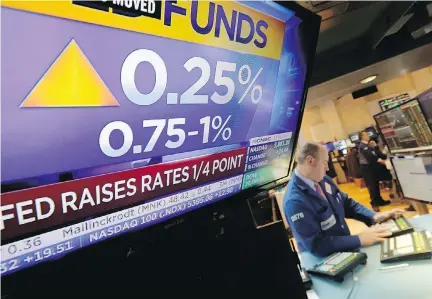  ?? RICHARD DREW/THE ASSOCIATED PRESS ?? The news of the Fed’s rate hike sent stock indexes in New York and Toronto surging Wednesday. The move comes nearly eight years after the Great Recession, with a strengthen­ing U.S. economy that is healthy enough to withstand steadily tighter credit.