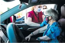  ?? AZ BIG MEDIA ?? n The drive-through vaccinatio­n site in Arizona has 24-hour continuous operations.