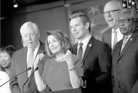  ?? DREW ANGERER/GETTY IMAGES ?? From left, House Minority Whip Steny Hoyer, House Minority Leader Nancy Pelosi, Rep. Eric Swalwell, Rep. Joe Crowley and Rep. James Clyburn hold a news conference in the House Visitors Center after the withdrawal of the House Republican healthcare bill...