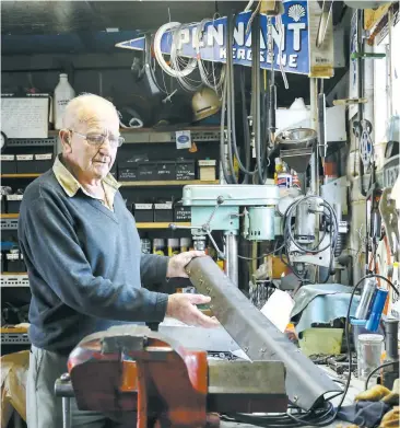  ??  ?? In his 80s, Lloyd Chudleigh still loves working on cars and trucks.