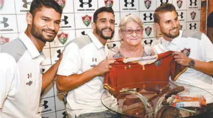  ?? MAILSON SANTANA/FLUMINENSE ?? Gum, Henrique Dourado e Henrique participar­am de evento com torcedores para lançar a terceira camisa