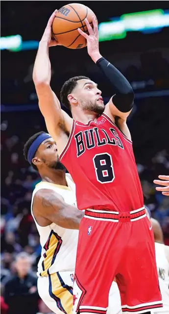  ?? GERALD HERBERT/AP ?? The Bulls and shooting guard Zach LaVine struck a five-year, $215.2 million deal Friday.