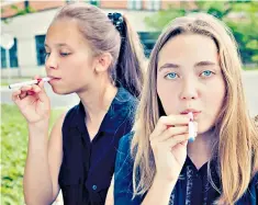  ??  ?? ‘Not as bad as smoking’: almost one in six people aged 11 to 18 have tried vaping