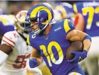  ?? HARRY HOW GETTY IMAGES ?? Rams wide receiver Cooper Kupp is one of five unanimous choices for the Associated Press’ 2021 NFL All-Pro Team.