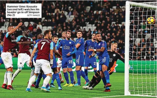  ?? GETTY IMAGES ?? Hammer time: Kouyate (second left) watches his header go in off Simpson (No 2)