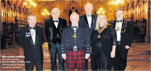  ?? ?? Successful evening Members of the Hammermen Society with Renfrewshi­re Provost Lorraine Cameron