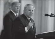  ?? ASSOCIATED PRESS ?? IN THIS JULY 8 file photo, President Donald Trump listens as Secretary of the Interior David Bernhardt speaks during an event on the environmen­t in the East Room of the White House in Washington.