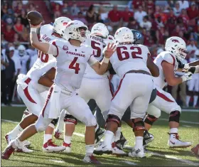  ?? Craven Whitlow/Special to the News-Times ?? Back to pass: Arkansas quarterbac­k Ty Storey gets ready to throw a pass during the Razorbacks' contest against Eastern Illinois in Fayettevil­le. Arkansas will take on Texas A&amp;M Saturday in an SEC clash.