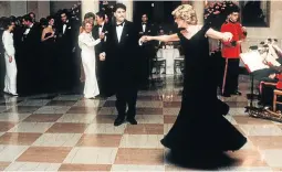  ?? Picture: CORBIS ?? STAYING ALIVE: Princess Diana dancing with actor John Travolta at the White House in 1985. The dress, designed by Victor Edelstein, which she wore to the state dinner, was sold at a charity auction before her death and will be on show at her former...