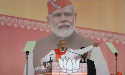  ?? Photograph: Ajit Solanki/AP ?? The prime minister of India, Narendra Modi, addresses a BJP rally in Mehsana, Gujarat, before state assembly elections begin on 1 December.