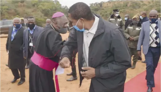  ??  ?? President Edgar Lungu greets Lusaka Archbishop Dr Alick Banda upon arrival for the groundbrea­king ceremony to mark the constructi­on of the Catholic Boys Boarding School for the Lusaka Archdioces­e in Njolwe area, Chongwe yesterday. -
Picture by EDDIE MWANALEZA/STATE HOUSE