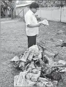  ??  ?? A distributo­r of Jaffna Thinakkura­l paper was attacked and his motorbike was set ablaze by unidentifi­ed people early morning yesterday. The picture shows the torched motorbike and newspapers. TNA Parliament­arian E. Saravanapa­van is at the...