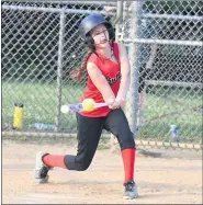  ??  ?? Bulldogs’ Camryn O’Connor slams a double to drive home 2 runs.