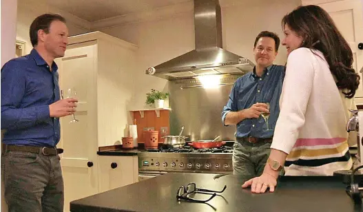  ??  ?? Playing the domestic card: Nick and Miriam Clegg in their kitchen with ITV political editor Tom Bradby