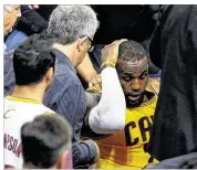  ?? JASON MILLER / GETTY IMAGES ?? LeBron James needed stitches for a cut to his head in Game 4, just another injury concern for the short-handed Cavaliers this postseason.