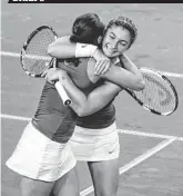  ?? FELICE CALABRO/AP ?? Italy's Sara Errani (right) and Roberta Vinci celebrate winning their Fed Cup doubles match that eliminated the U.S. on Sunday.