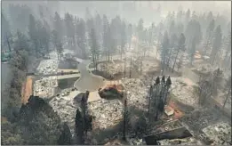  ?? Carolyn Cole Los Angeles Times ?? THE CAMP FIRE, which roared through Paradise, Calif., killing at least 88 people, “outstrippe­d our planning efforts in sheer time,” a fire official said.