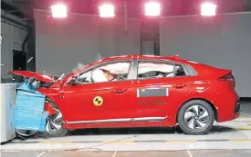  ??  ?? Many safety systems are coming from the developmen­t of autonomous vehicles. Below: The Hyundai Ioniq undergoing Euro NCAP crash testing.