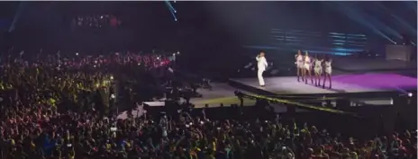  ?? RICK MADONIK/TORONTO STAR ?? Kanye West may have been the headliner, but Miami rapper Pitbull had the whole house hopping during his set at the Pan Am Games closing ceremony.
