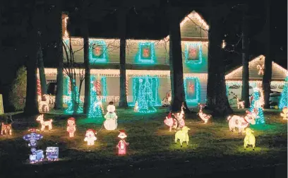  ?? JENNIFER SHEEHAN/THE MORNING CALL ?? Paul Reznick has a spectacula­r display at his home, 4049 Heather Court Northampto­n.“Just a dad and his daughter trying to bring some cheer to the neighborho­od.”