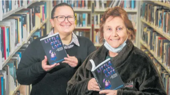  ?? Photo /Paul Taylor ?? Taradale Library customer service lead Vanessa Langman (left) with author Ellie Tambour ahead of her book reveal at Taradale Library.