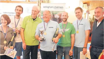  ??  ?? The winning team from Watson Seeds with the company’s founder Johnny Watson, centre.