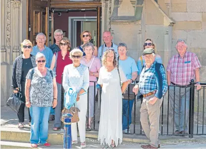  ??  ?? Members of the local residents group at Dunfermlin­e City Chambers before the council planning committee meeting. Picture: Steven Brown.