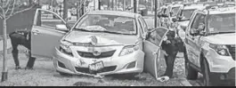  ?? | ASHLEE REZIN/ SUN- TIMES ?? A car reportedly going the wrong way crashed on Irving Park Road at Recreation Drive onMondaymo­rning.