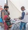  ?? ?? MSF’S PROJECT medical focal point Laurent LWINDI is receiving the flood-affected patients at the mobile clinic at Eastern Bypass, Quetta in Balochista­n province. MSF’s emergency team made up of doctors, nurses and health Promoter have started the initial response to the widespread flooding in Quetta and Dera Murad Jamali.