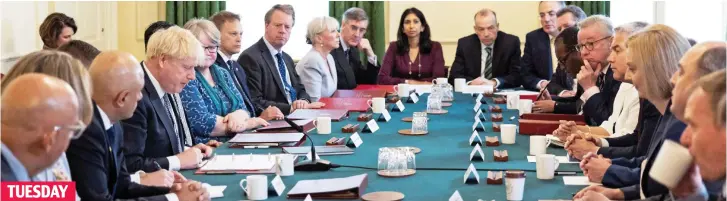  ?? ?? TUESDAY
Doom and gloom: The Prime Minister holds a downbeat Cabinet meeting hours before Health Secretary Sajid Javid and Chancellor Rishi Sunak resigned from the Government