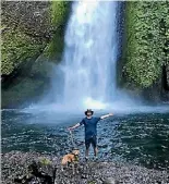  ??  ?? Barry’s son John and dog Zeke under an Eagle Creek waterfall in the Columbia gorge, Oregon.