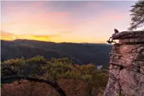  ?? West Virginia Tourism Office ?? ■ Rock climbers, along with white-water enthusiast­s and other adventurer­s, have long prized West Virginia’s New River Gorge, which was redesignat­ed as a national park and preserve in December.