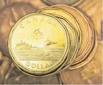  ?? REUTERS ?? The loonie, according to Scotiabank analyst Shaun Osborne, currently holds a 75 to 80 per cent correlatio­n to the S&P 500 and so anything that positively influences the index will have the same effect on the Canadian currency.