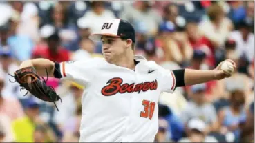  ?? RYAN SODERLIN — THE OMAHA WORLD-HERALD VIA AP ?? Oregon State pitcher Jake Mulholland (38) throws against Cal State Fullerton in the fifth inning of an NCAA men’s College World Series baseball game in Omaha, Neb., Saturday.