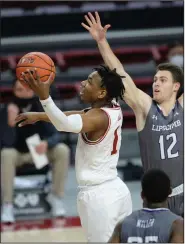  ?? (NWA Democrat-Gazette/Andy Shupe) ?? Arkansas guard JD Notae has played off the bench in 25 of 26 games this season and scored 12 or more points 18 times. His season-high is 22 points, which he accomplish­ed twice.