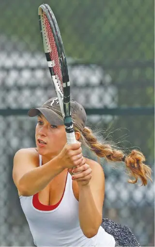  ?? STAFF PHOTO BY DOUG STRICKLAND ?? Baylor’s Drew Hawkins, pictured, swept her singles match against GPS’s Maddox Bandy in the Division II-AA team state championsh­ip Wednesday in Murfreesbo­ro, and the Lady Red Raiders won 4-0 to earn the title for the seventh consecutiv­e season.