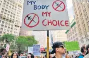  ?? AFP ?? Protesters opposed to Covid-19 vaccine mandate and vaccine passports rally at City Hall in New York City.