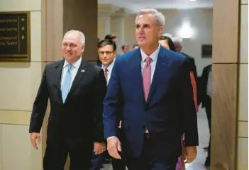  ?? PATRICK SEMANSKY/AP ?? House Minority Leader Kevin McCarthy, R-Calif., right, and Minority Whip Steve Scalise, R-La., will serve as the next speaker and majority leader in the House, leading what is expected to be its slimmest majority in two decades.