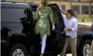  ??  ?? Melania Trump wearing a Zara jacket that reads, “I don’t really care. Do U?” Photograph: Andrew Harnik/AP