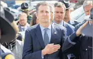  ?? STEVE HELBER/AP ?? Embattled Virginia Gov. Ralph Northam attended the funeral of a state trooper Saturday in Chilhowie, Va.
