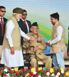  ?? PTI ?? PM Narendra Modi with Indian National Army veteran Lalti Ram during the ceremony to mark the 75th anniversar­y of the ‘Azad Hind government’, in New Delhi yesterday.