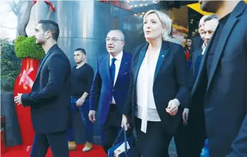  ?? (Jamal Saidi/Reuters) ?? MARINE LE PEN, the French National Front leader and a candidate for president, leaves a hotel after attending a news conference in Beirut yesterday.