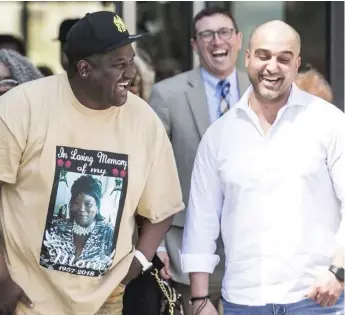  ?? ASHLEE REZIN/ SUN- TIMES ?? Anthony Jakes ( left), 41, and Robert Bouto, 42, walk out of the Leighton Criminal Courthouse on Monday.