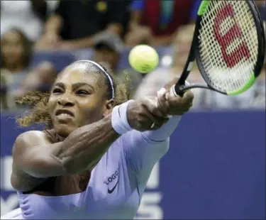  ?? THE ASSOCIATED PRESS ?? Serena Williams returns a serve by Carina Witthoeft, of Germany, during the second round of the U.S. Open tennis tournament Wednesday in New York.