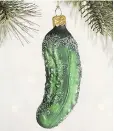  ??  ?? A Glass Pickle Ornament is apparently good luck.